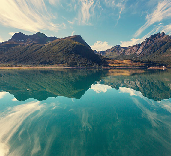 calm-lake-with-mountain-and-sky-reflection-wallpaper-wallpaper-thumb